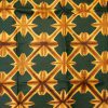 Tissu africain en bazin vert militaire, jaune et brun, motifs kaléidoscope