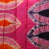 Tissu africain bazin rose, orange, violet et crème, motif feuille de palmier