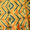 Tissu africain en bazin café, jaune, orange et bleu motif dune