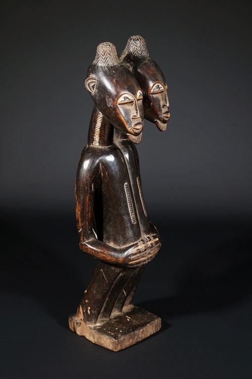 Statue bicéphale de siamois de Côte d'ivoire